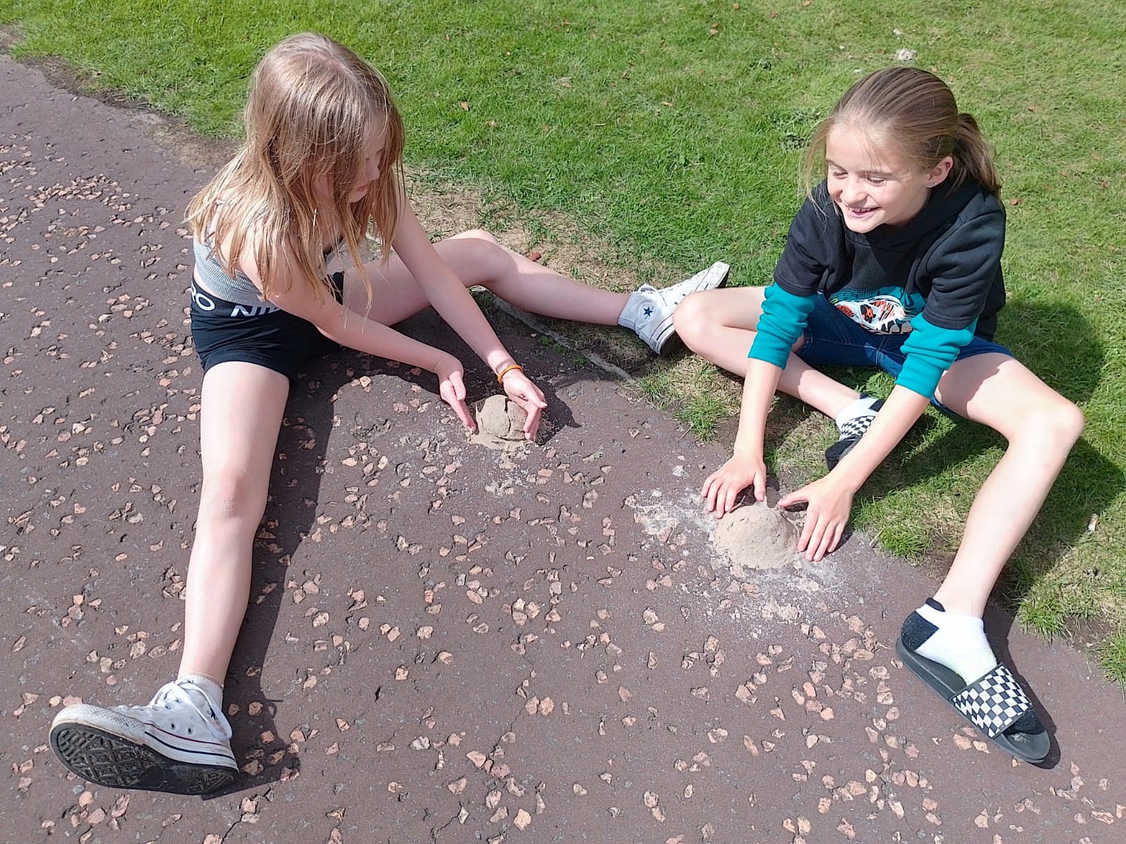 children building sandcastles